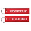 Brelok / Zawieszka do kluczy - REMOVE BEFORE FLIGHT - F-35 Lightning II - Czerwony